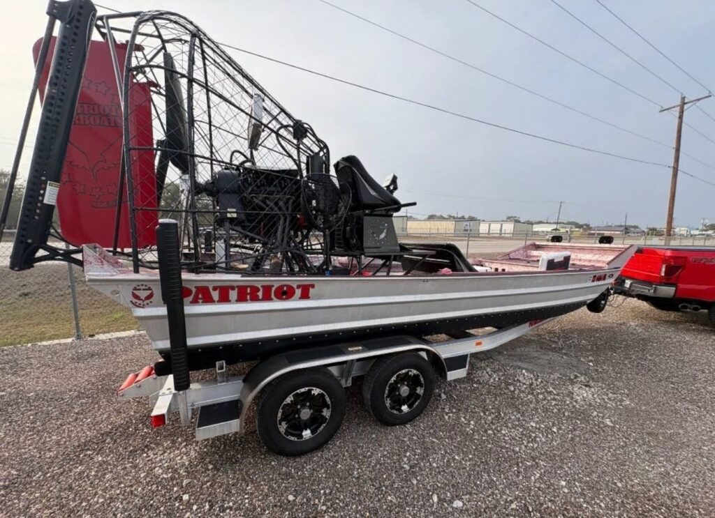 right side view of 2025 Patriot airboat on trailer