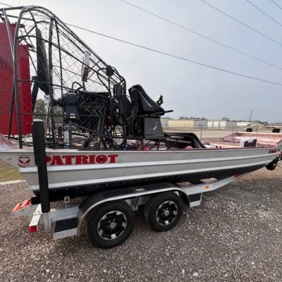 right side view of 2025 Patriot airboat on trailer